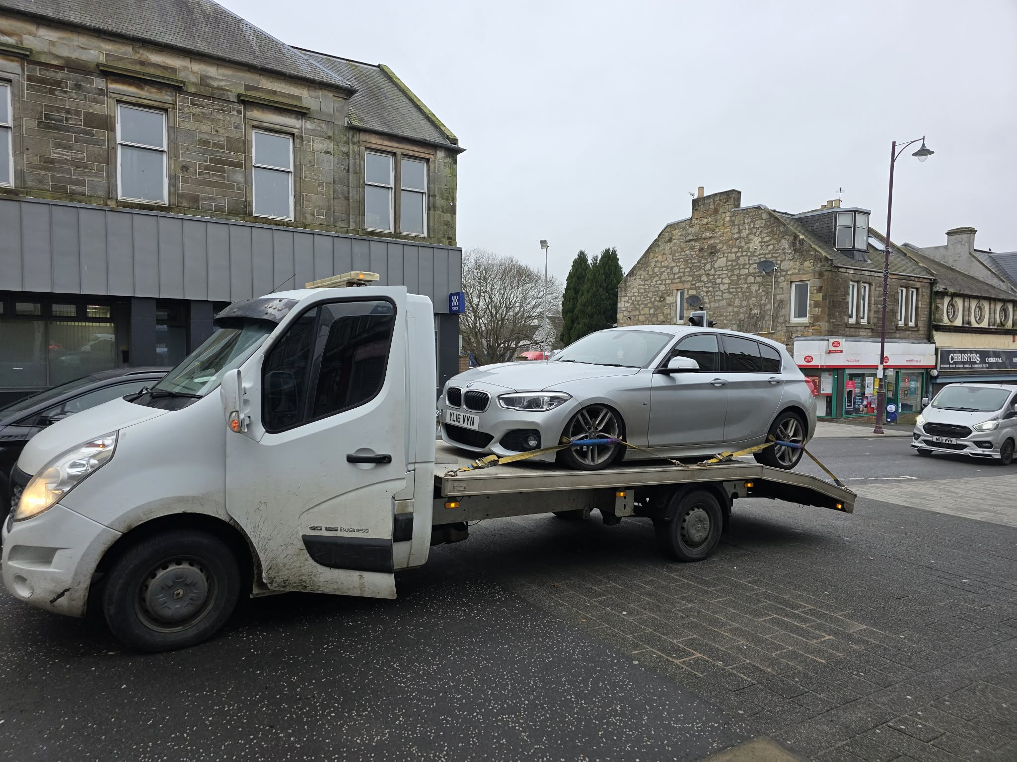 GTT Recovery collecting a silver BMW from a town centre high street