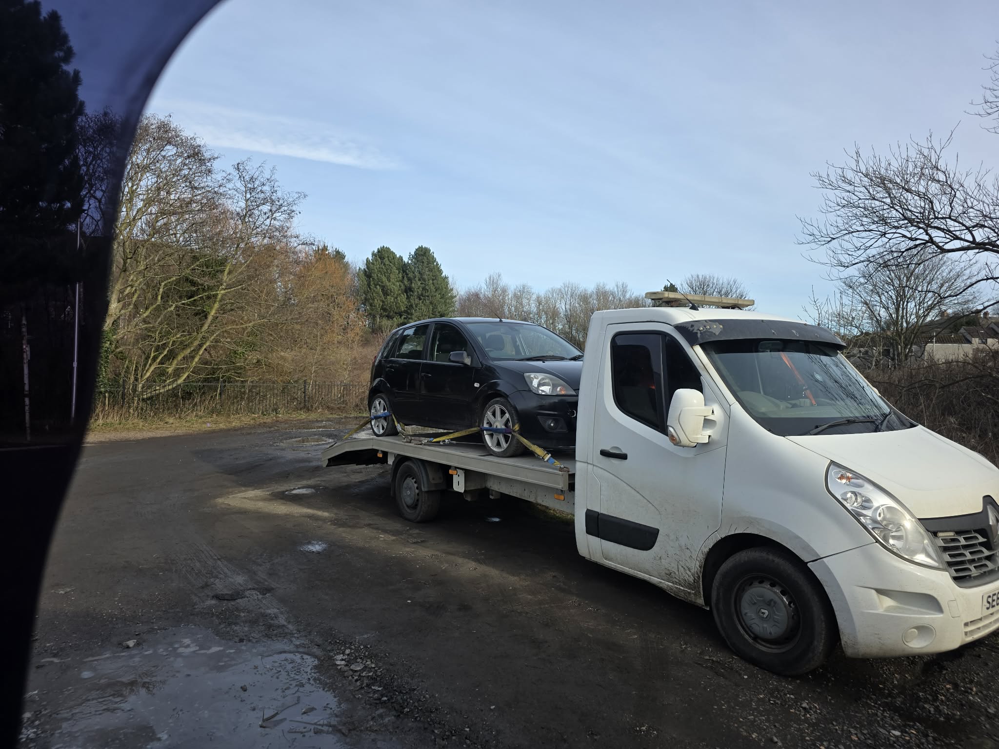 GTT Recovery transporting a vehicle on a sunny day near Kelty